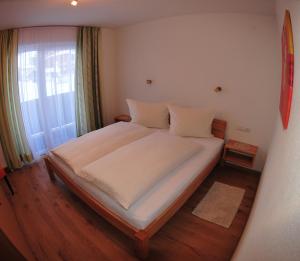 Letto o letti in una camera di Haus Scheiber