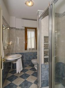 Ванна кімната в Hotel Lupori