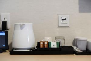 a counter with a blender and other items on it at The Light Inn - Vacation STAY 94706 in Tokyo