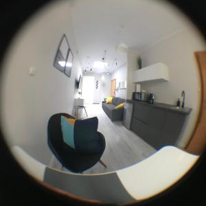 Kuchyň nebo kuchyňský kout v ubytování Apartamenty Długa 6