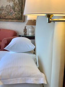 Postel nebo postele na pokoji v ubytování Thermae Sylla Spa & Wellness Hotel