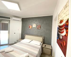 Voodi või voodid majutusasutuse Siclari B&B-Rooms&Suite toas