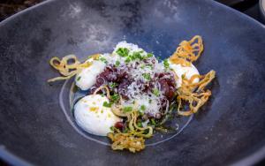 a plate of food with eggs and noodles at Arctic Skylight Lodge in Äkäslompolo +30 photos