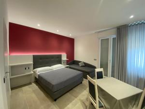 Postel nebo postele na pokoji v ubytování B&B Bertani
