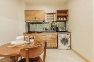 A cozinha ou cozinha compacta de TimurBay Stunning By CA CON