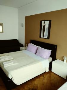 Postel nebo postele na pokoji v ubytování B&B in Arena L' Opera