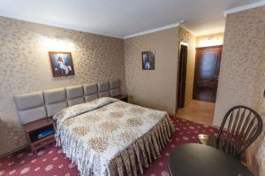 Ένα ή περισσότερα κρεβάτια σε δωμάτιο στο Отель Наутилус