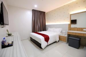 TV a/nebo společenská místnost v ubytování B&L HOTEl + 24 fotografií