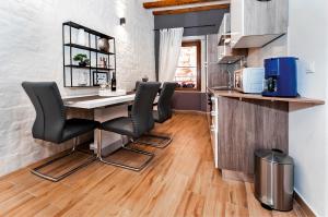 Kuchyň nebo kuchyňský kout v ubytování Luxury Apartment KASTELA ANTIKA