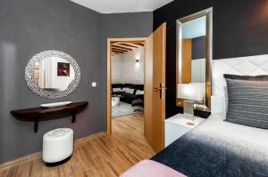 Posteľ alebo postele v izbe v ubytovaní Luxury Apartment KASTELA ANTIKA