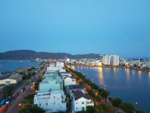 an aerial view of a city with a body of water at Thanh Van Hotel Quy Nhon in Quy Nhon