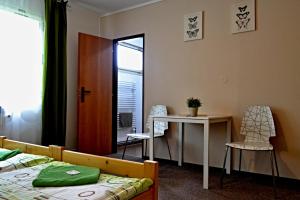 Postel nebo postele na pokoji v ubytování Hostel U Sv. Štěpána