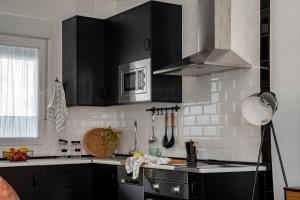 Kuchnia lub aneks kuchenny w obiekcie Apartamentos Rurales Helechosa, Las Tres Peñas