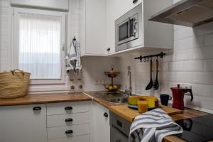 Kuchnia lub aneks kuchenny w obiekcie Apartamentos Rurales Helechosa, Las Tres Peñas