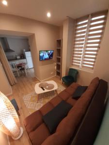 Μια τηλεόραση ή/και κέντρο ψυχαγωγίας στο 4 Apt T2 50 à 60 M2 déplacement "PRO" ou "couple avec enfants" Les Hauts De Bourg "
