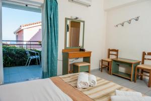 Posteľ alebo postele v izbe v ubytovaní Porto Skala Village Hotel