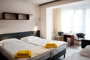 Giường trong phòng chung tại Graal SPA +67 ảnh