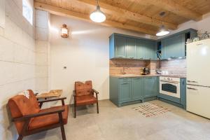 Kuchyň nebo kuchyňský kout v ubytování Holiday Home Lipa Naša