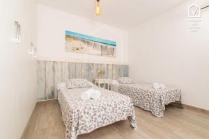 Giường trong phòng chung tại C350 Cantino by Mallorca Villa Selection +19 ảnh