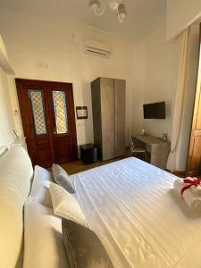 Posteľ alebo postele v izbe v ubytovaní Residenza san gennaro