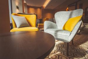 Uma área de estar em Hotel Bernina Geneva