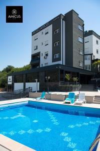Bazén v ubytování Hotel Amicus nebo v jeho okolí