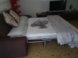 Posteľ alebo postele v izbe v ubytovaní Accogliente Casa Indipendente con Wi-Fi Gratuito, a Due Passi dal Centro e dalle Attrazioni