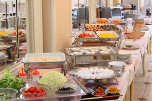 a buffet line with many different types of food at Hotel Capital in Yamagata in Yamagata