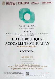 un trozo de papel con el folleto de un hotel en Hotel Boutique Acocalli, en San Juan Teotihuacán