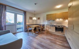 Kuchyň nebo kuchyňský kout v ubytování Appartements Christine