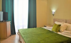 Postel nebo postele na pokoji v ubytování Hotel Park