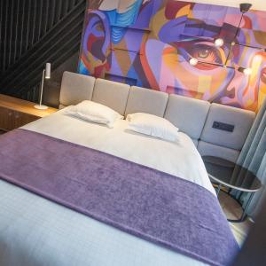 Postel nebo postele na pokoji v ubytování Ostend Hotel
