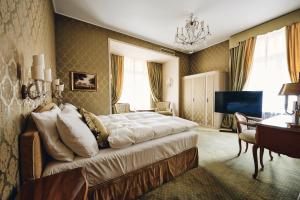 Säng eller sängar i ett rum på Hotel Europe