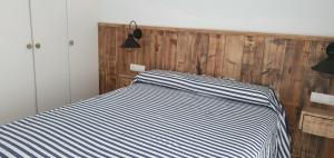 Postel nebo postele na pokoji v ubytování Apartamento en primera linea de mar - Sant Antoni de Calonge