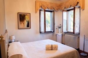 Postel nebo postele na pokoji v ubytování Bed and Breakfast Albe
