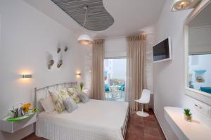Letto o letti in una camera di Adriani Hotel