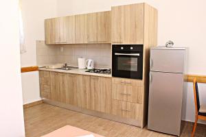 Kuchnia lub aneks kuchenny w obiekcie Studio Apartman Zara