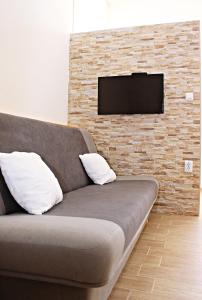 Telewizja i/lub zestaw kina domowego w obiekcie Studio Apartman Zara