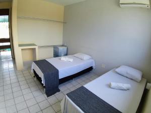 Postel nebo postele na pokoji v ubytování Hotel de Trânsito da PM-PE