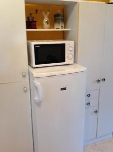 Kuchyňa alebo kuchynka v ubytovaní King Apartman