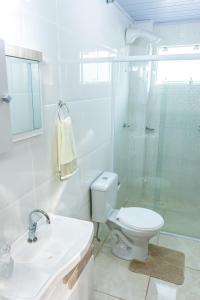 Koupelna v ubytování Apto1 COM AR COND WI-FI E TV SMART + 8 fotografií