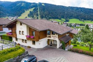 an aerial view of a house in the mountains at Ferienhaus Eva in Flachau