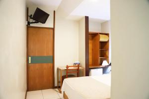 Postel nebo postele na pokoji v ubytování Hotel BH Palace