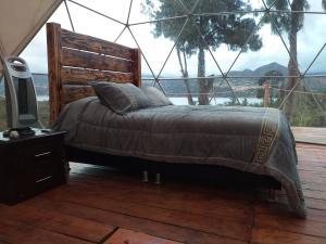 Postel nebo postele na pokoji v ubytování Glamping Bella Vista