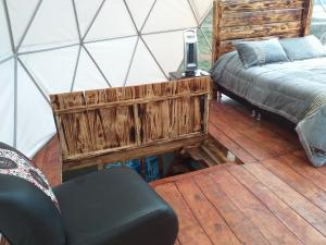 Postel nebo postele na pokoji v ubytování Glamping Bella Vista