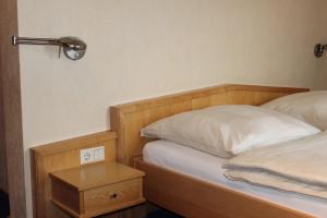 Voodi või voodid majutusasutuse Hotel Reiff toas