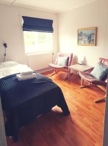 Posezení v ubytování Vertshuset Fannarheimr - Bed &Breakfast