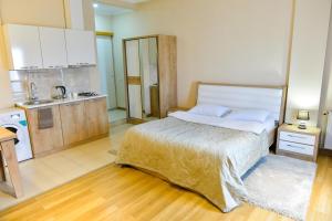 Postel nebo postele na pokoji v ubytování Happy Stay Hotel
