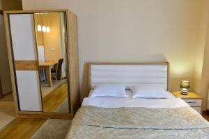 Postel nebo postele na pokoji v ubytování Happy Stay Hotel