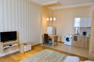 Kuchyň nebo kuchyňský kout v ubytování Happy Stay Hotel